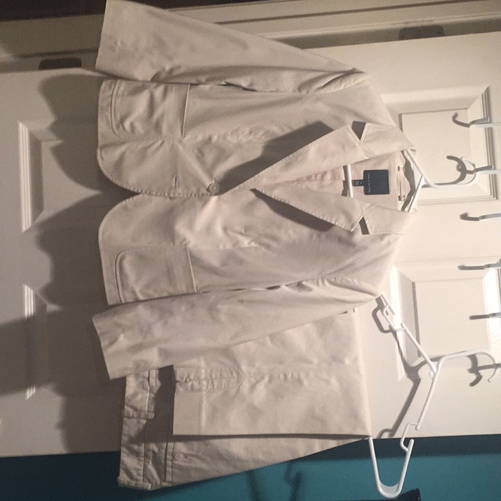 The Limited, khaki jacket, and 3/4 length slacks.